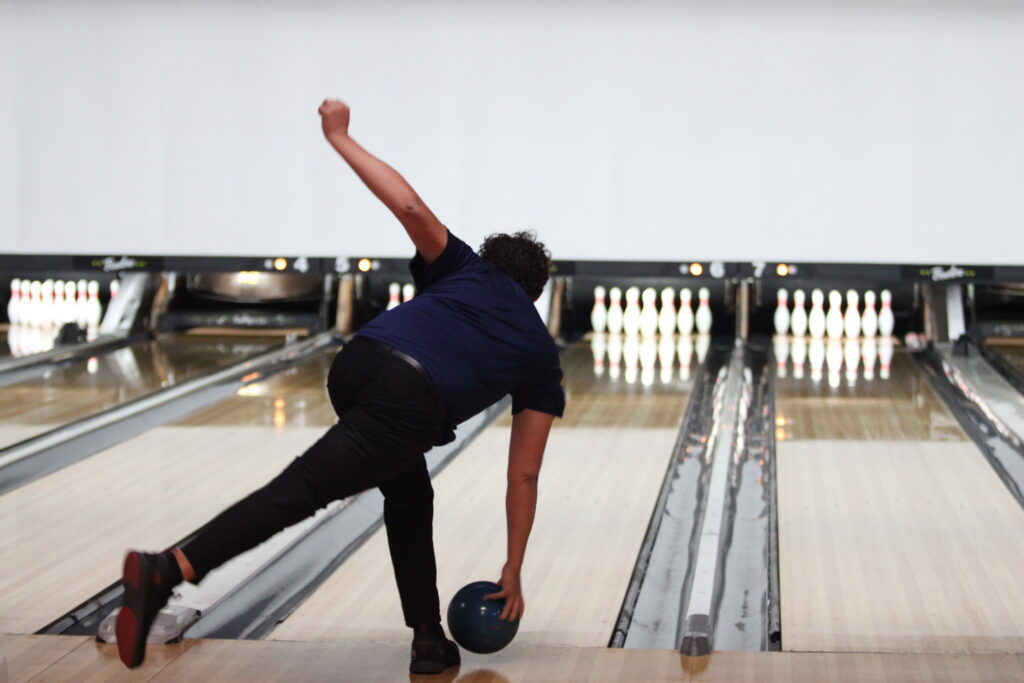 Wekiva's William Warren whips his ball up th alley from just above the ground.