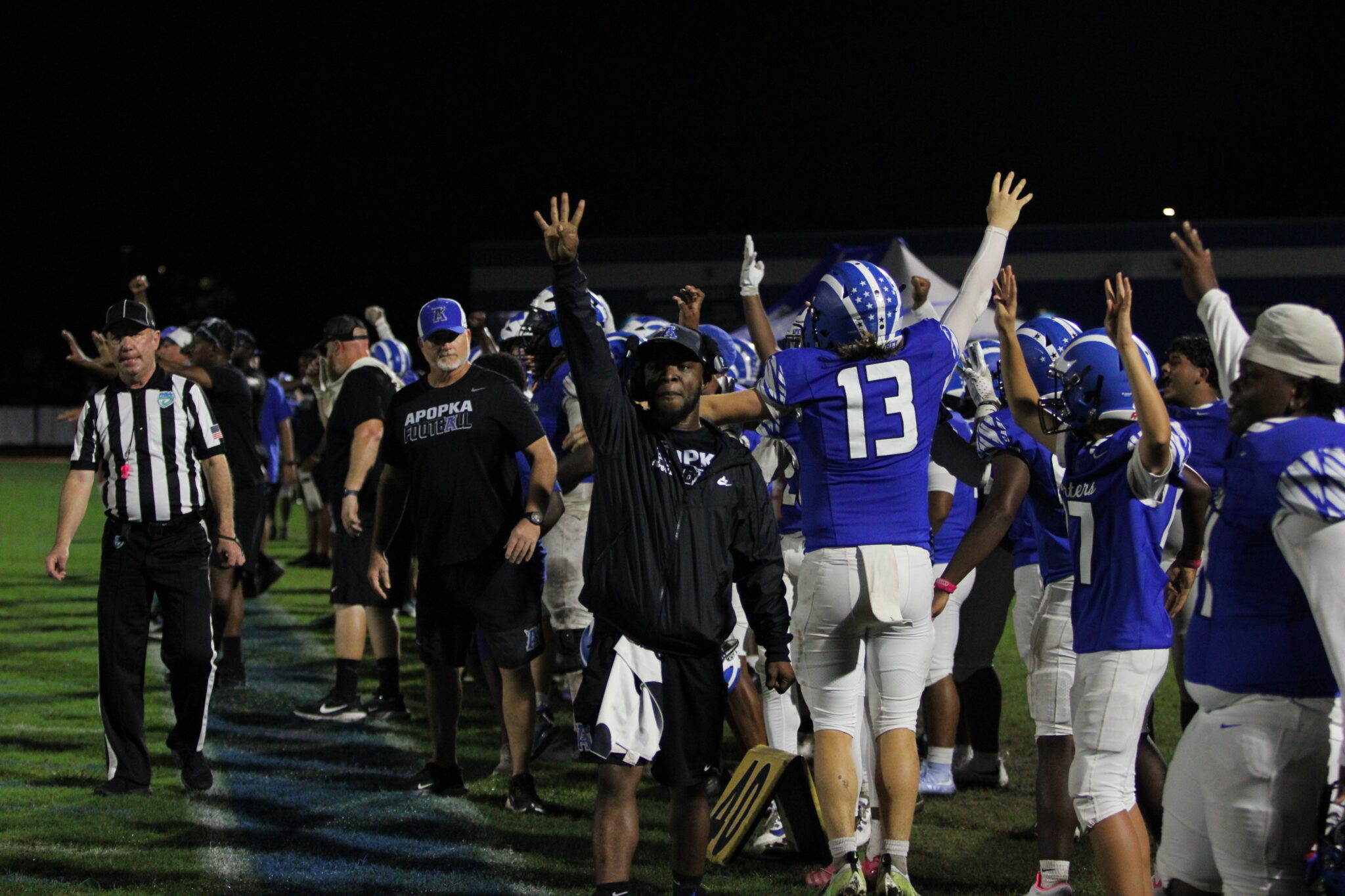 Apopka sideline hyped for the defensive fourth down to win the game.