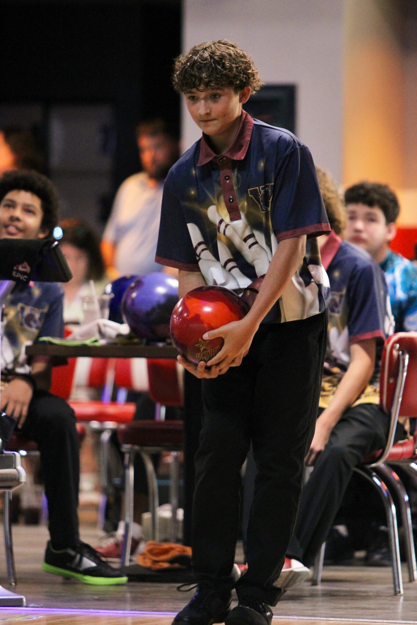 Blake Mcaulife focuses on the 10-pins in front of him.