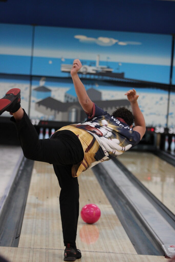 Delivering power and rotation, William Warren sends the ball tracking straight toward the pocket.
