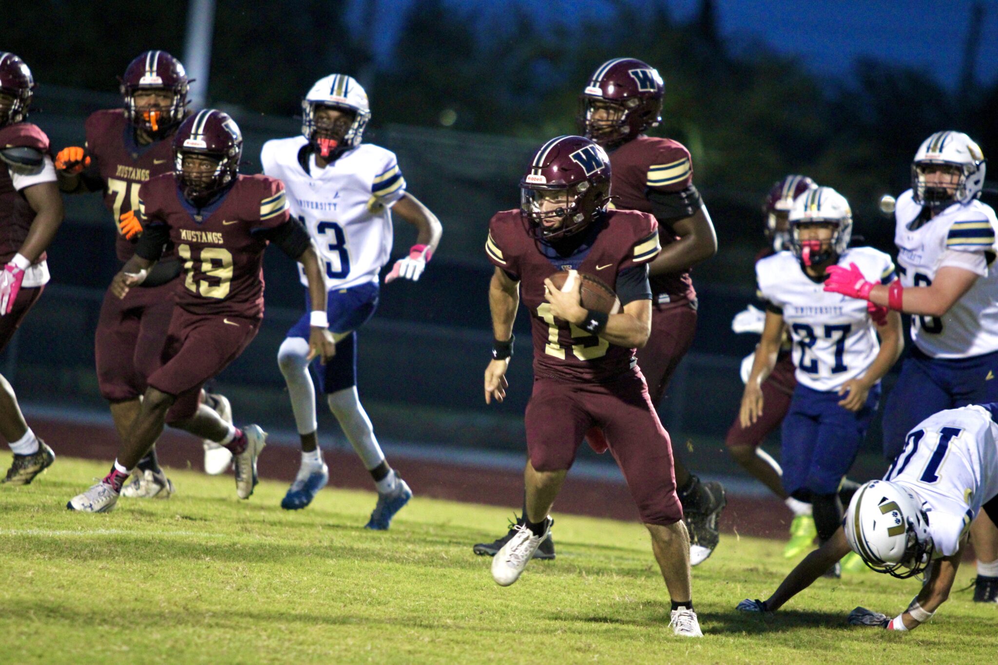 Dominick Sanguine sheds a tackler and bounces to the open left side of the field en route to the endzone.