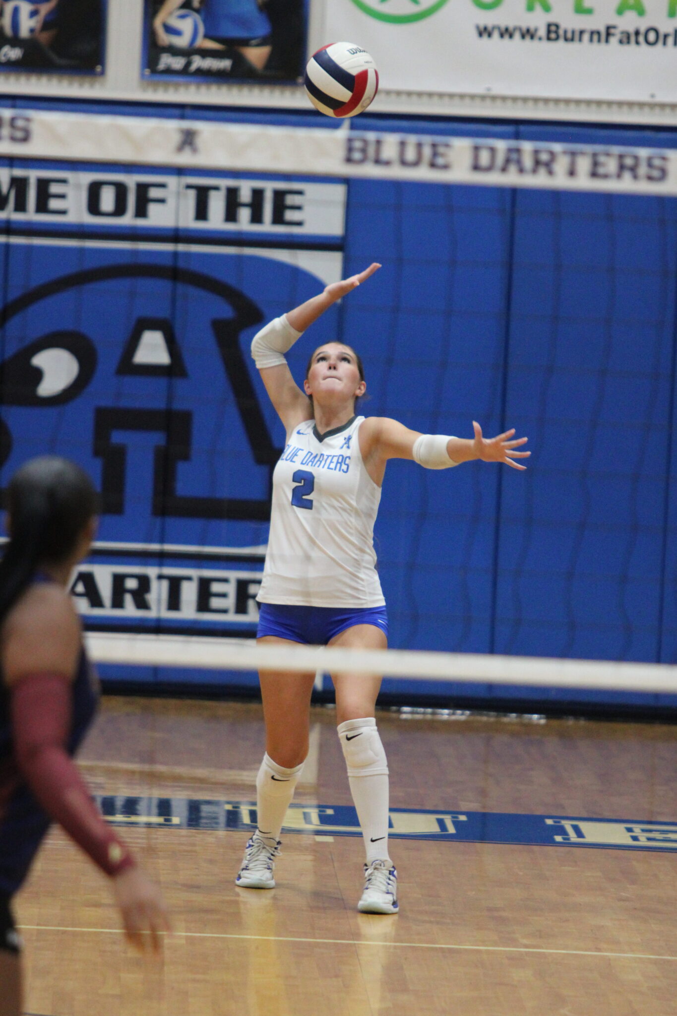 Emily Durham winds back a serve to send to Wekiva.