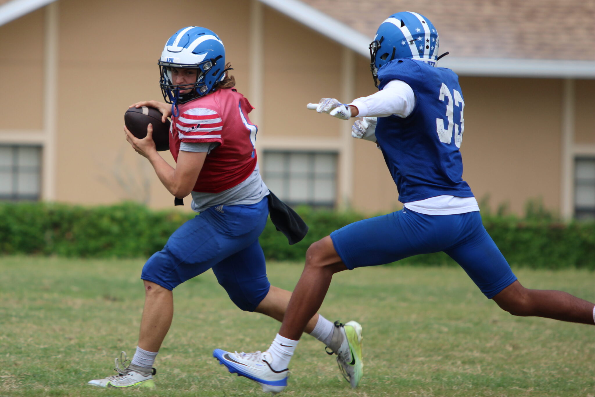 Hunter McNenney braces for impact on a QB scramble outside.