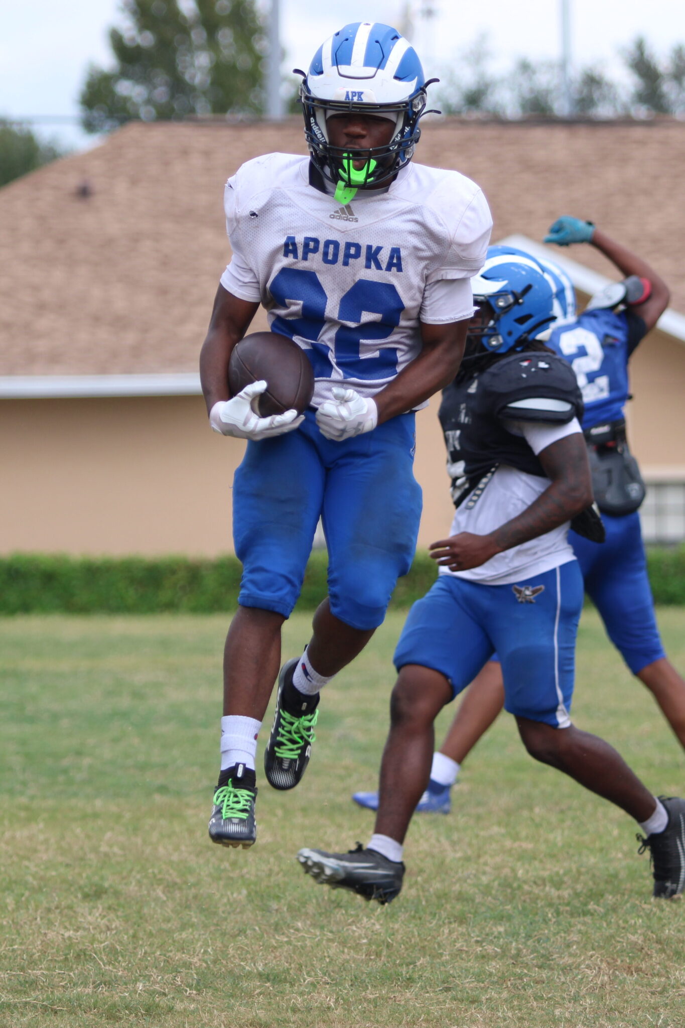 Jakyvion Kemp jumps into the endzone on a run through the defense in best on best drills.