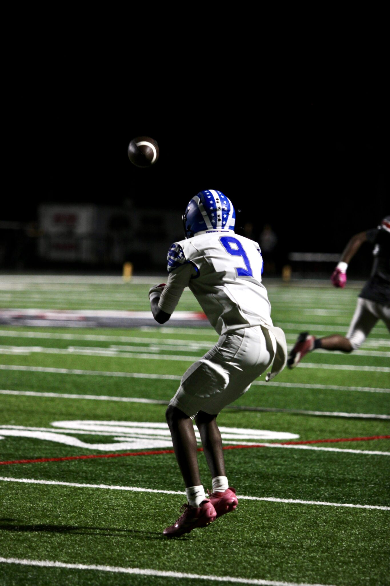 Johnson Navilssaint catches a ball in the red zone late in the game against Lake Mary.
