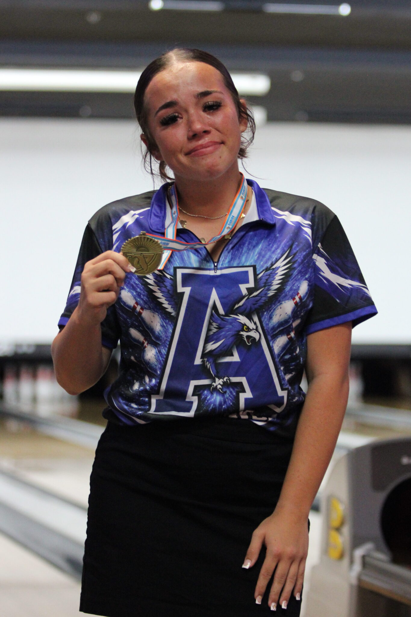 Madelynn Scofield sheds tears of joy after finishing first amongst a field of 60+ bowlers.