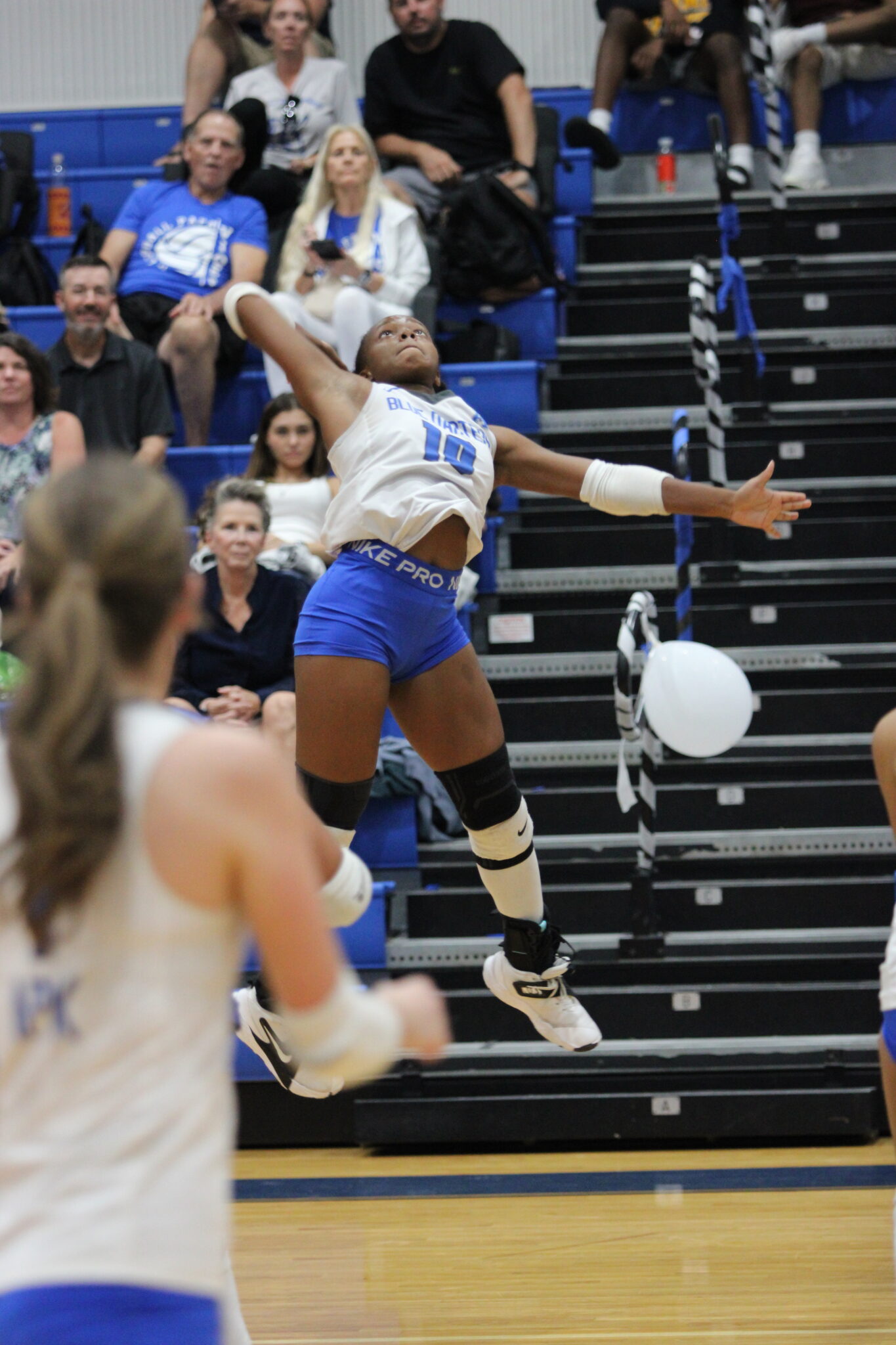 Marie Hughes rises up for a booming kill in the third set against Wekiva.