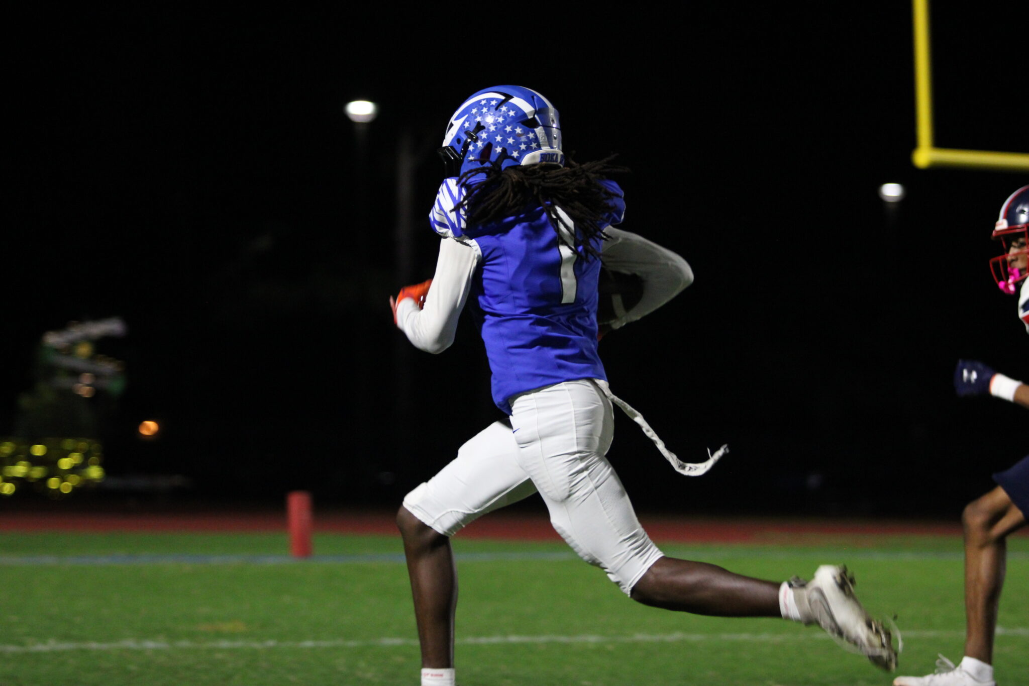 Nyzier Collington beats a Patriot to the end zone on his 35 yard catch and run.