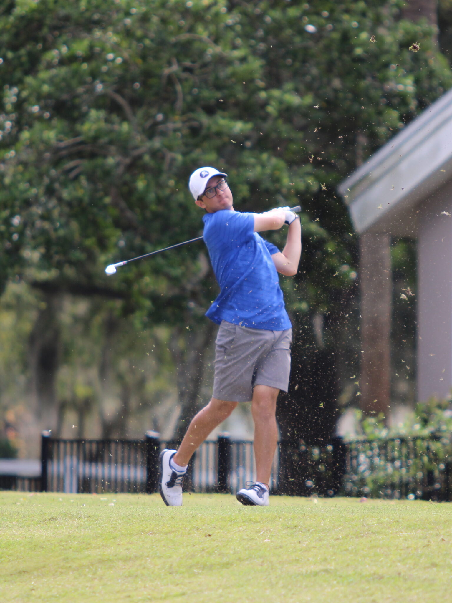 Paul Ancona drills a ball from the rough.