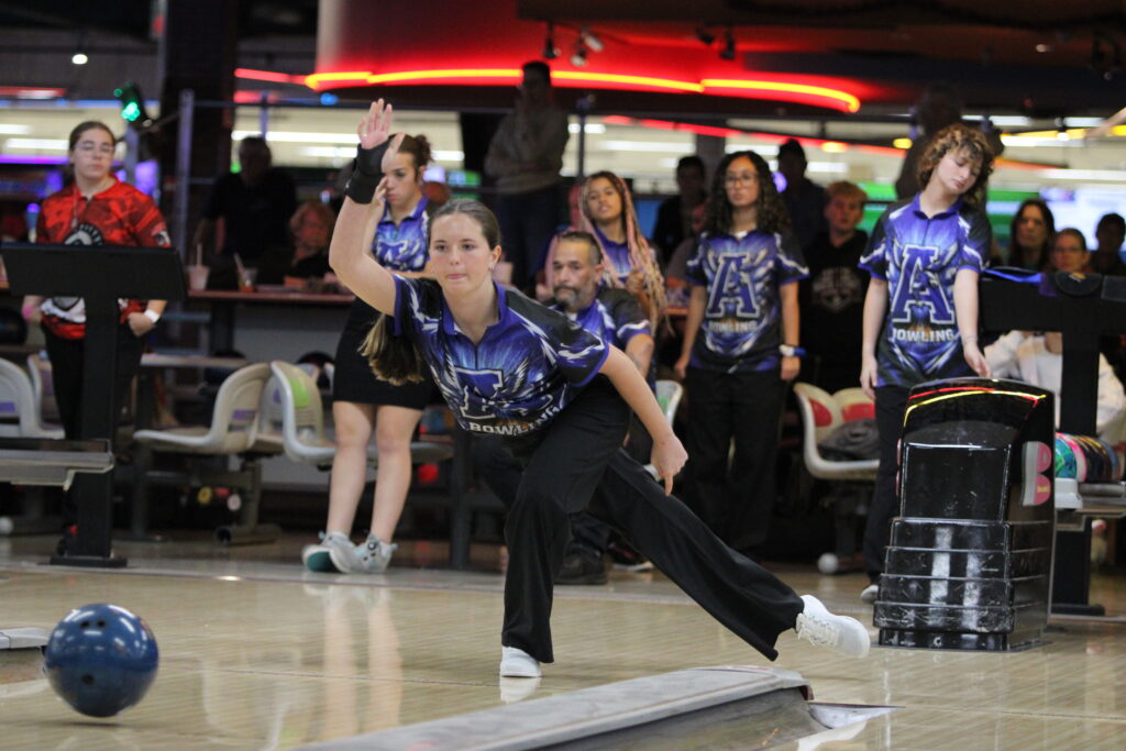 Taylor Blaszak torques her body for a powerful roll up the lane.
