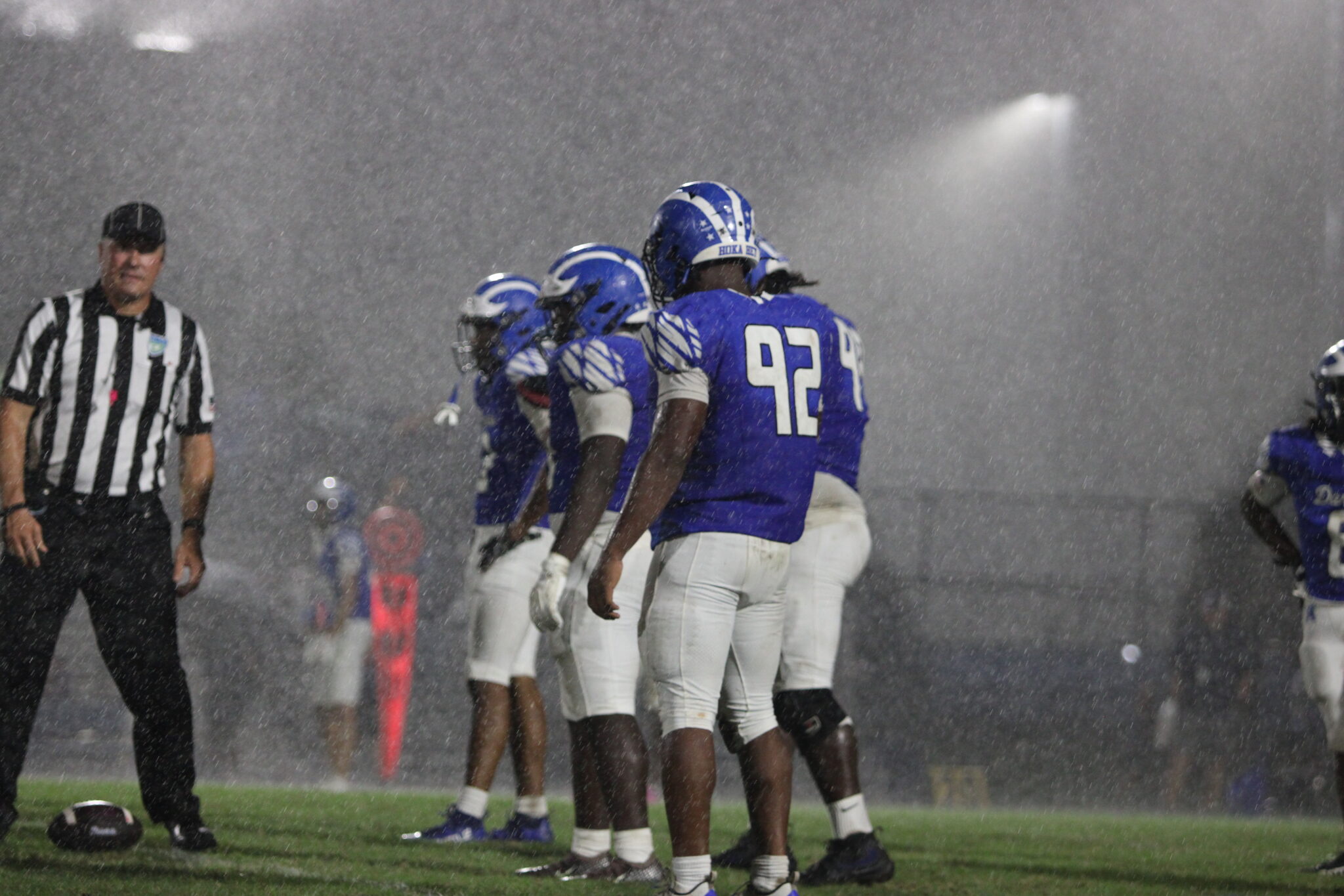 The pouring rain masks the field of Apopka in the second quarter.