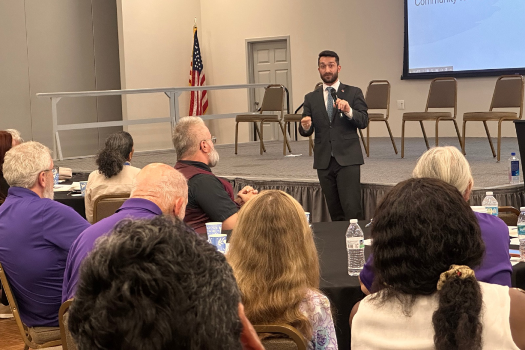 Apopka Mayor Nick Nesta addresses residents about employment opportunities during Hope Community Center's Thursday town hall at the Apopka Community Center.